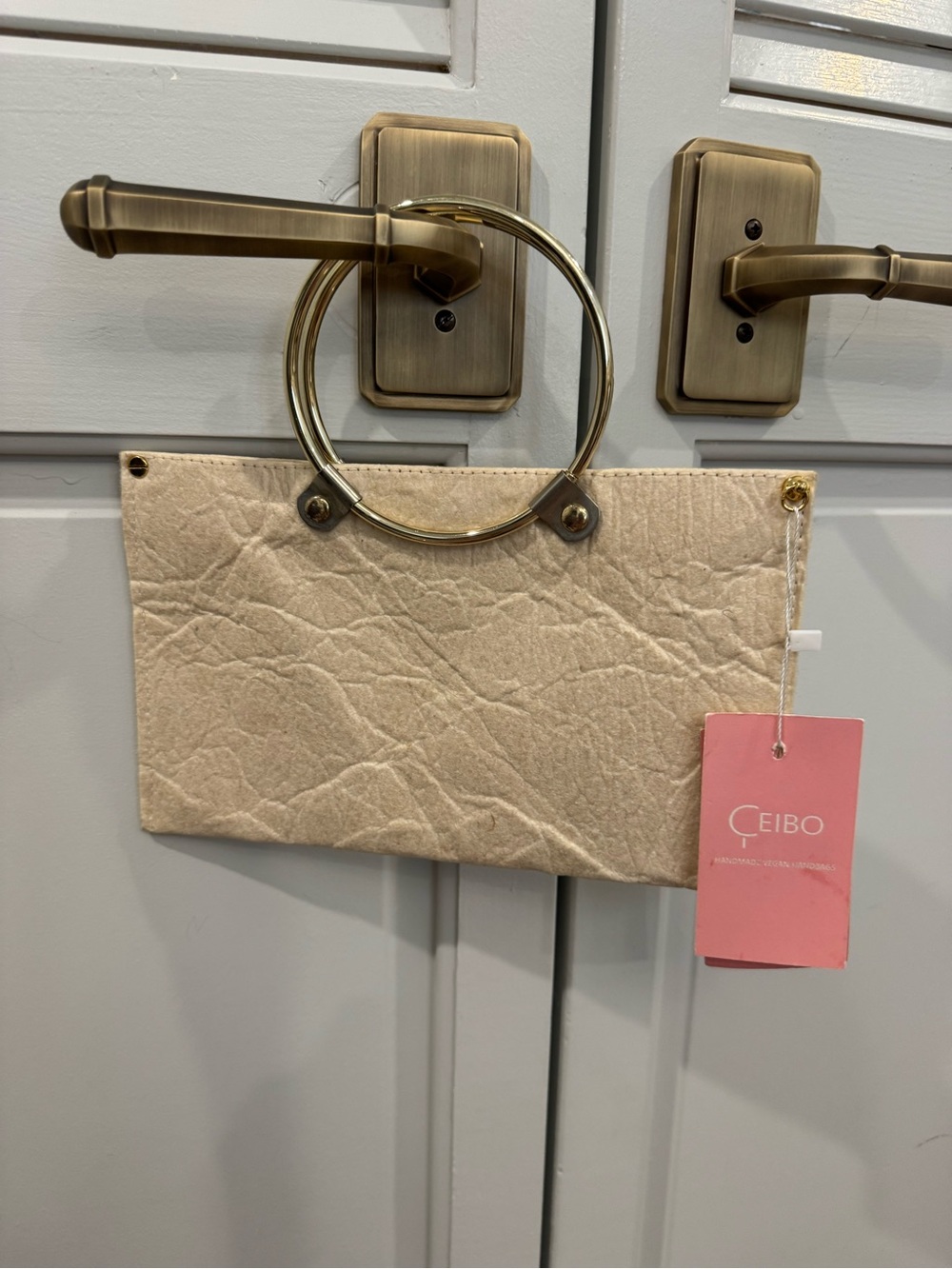 Beige Ring-Handle Clutch with Gold Hardware